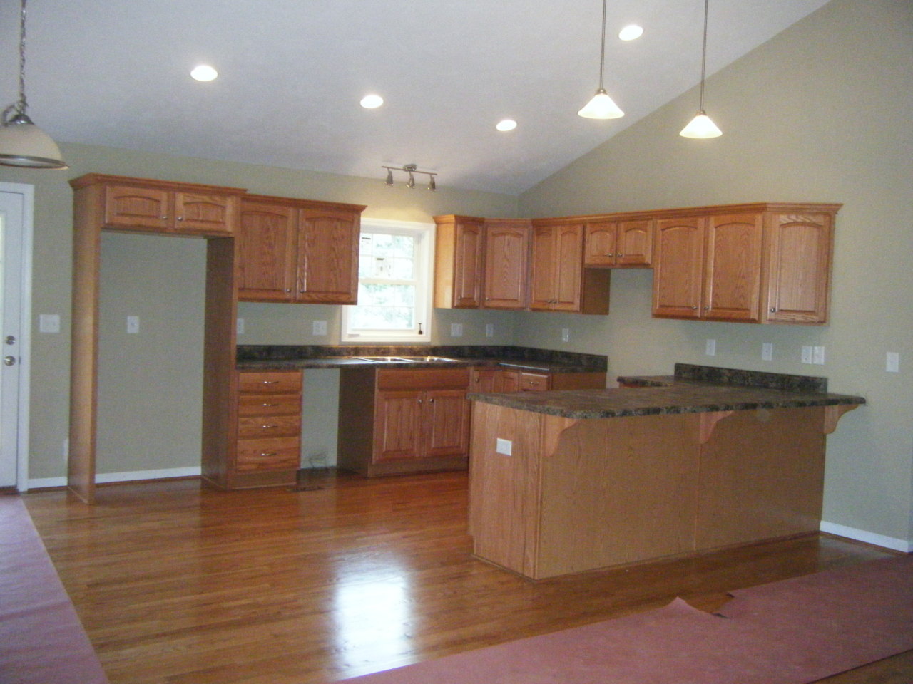 3 Goodview Road Goodview, VA 24095 - Photo 2 of 7 a kitchen with stainless steel appliances granite countertop a stove a sink and a refrigerator