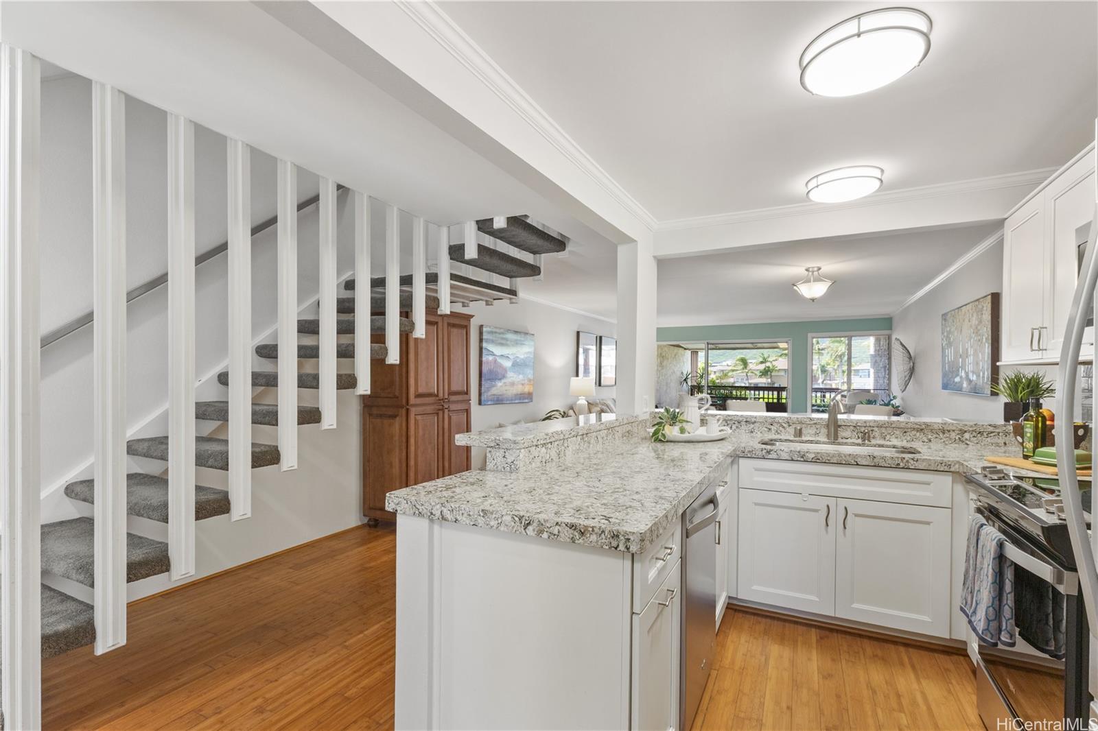 444 Lunalilo Home Road, Unit 123 Honolulu, HI 96825 - Photo 8 of 20 Wall removed from kitchen creates openness to the views.