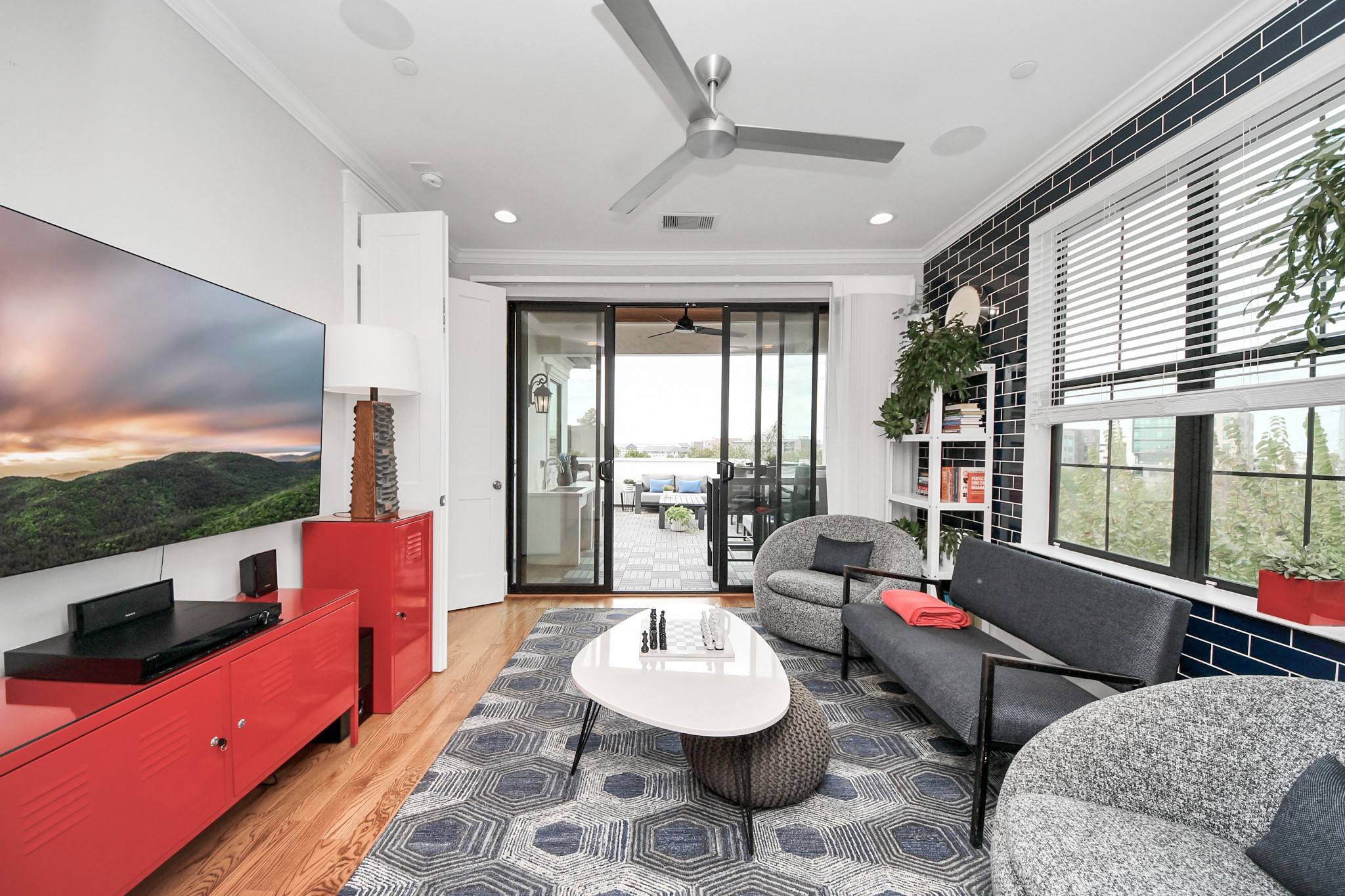 2765 Freund Street Houston, TX 77003 - Photo 35 of 44 a living room with furniture and a floor to ceiling window