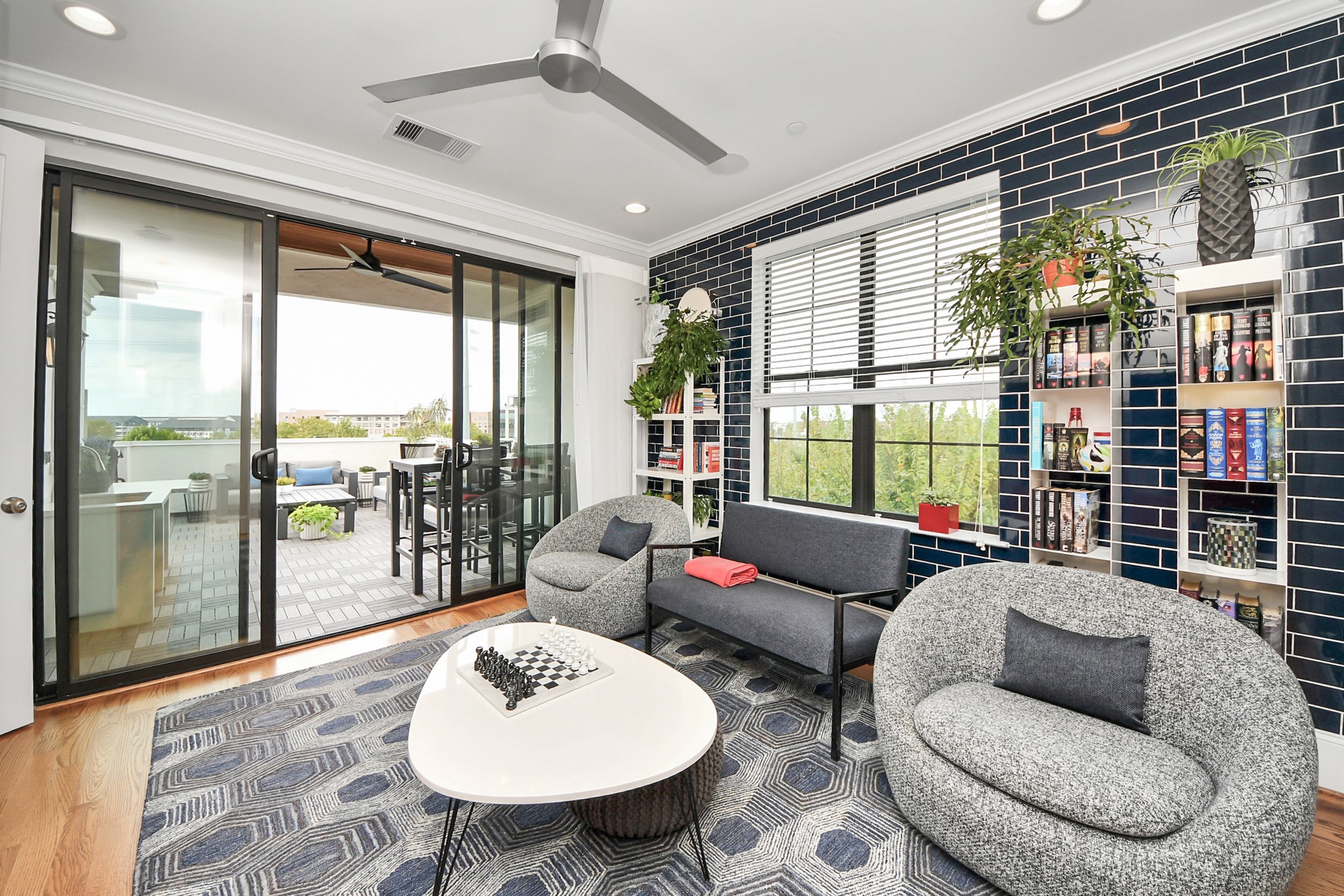 2765 Freund Street Houston, TX 77003 - Photo 5 of 44 a living room with furniture and a floor to ceiling window