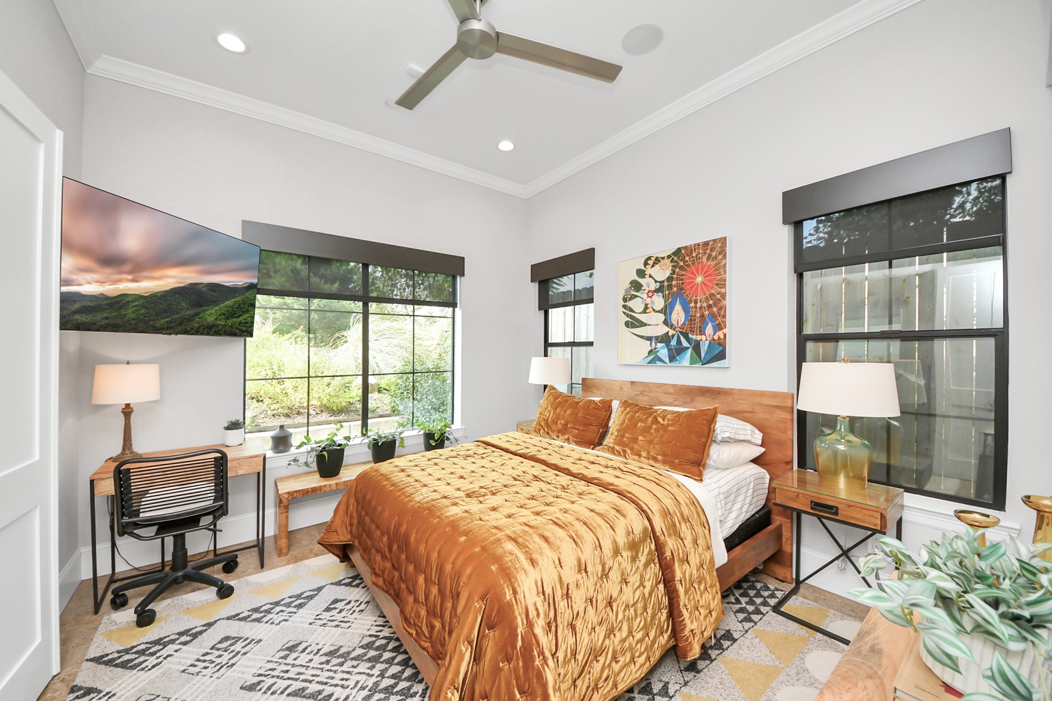 2765 Freund Street Houston, TX 77003 - Photo 6 of 44 a bedroom with a large bed and a window