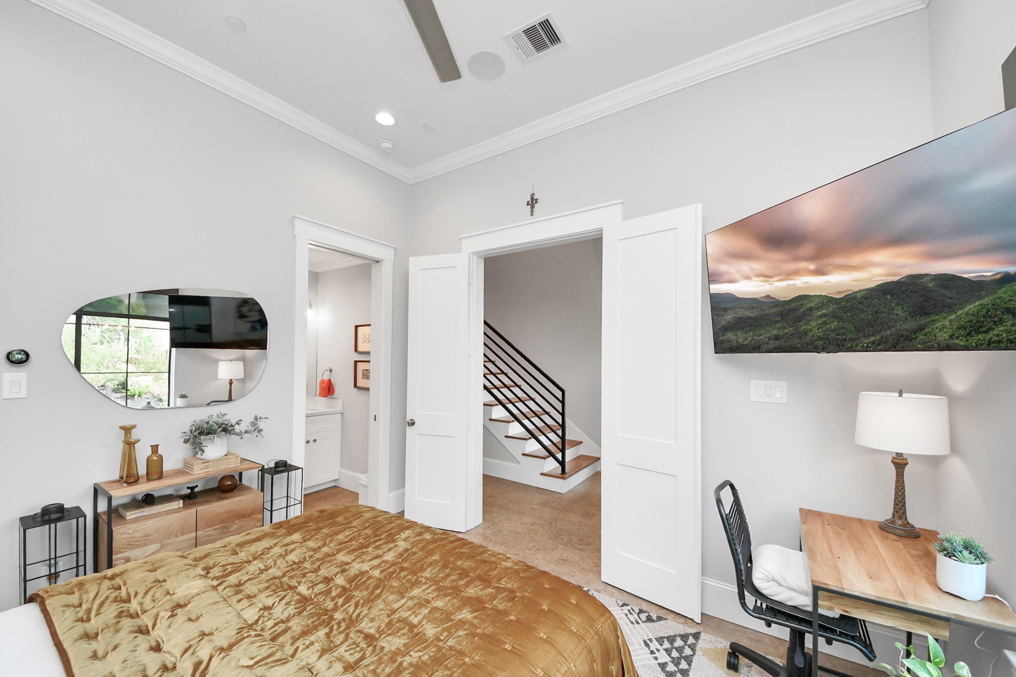 2765 Freund Street Houston, TX 77003 - Photo 7 of 44 Step into the spacious ground floor suite, with 11 ft ceilings, through elegant double doors, offering seamless flow from the expanded entryway.