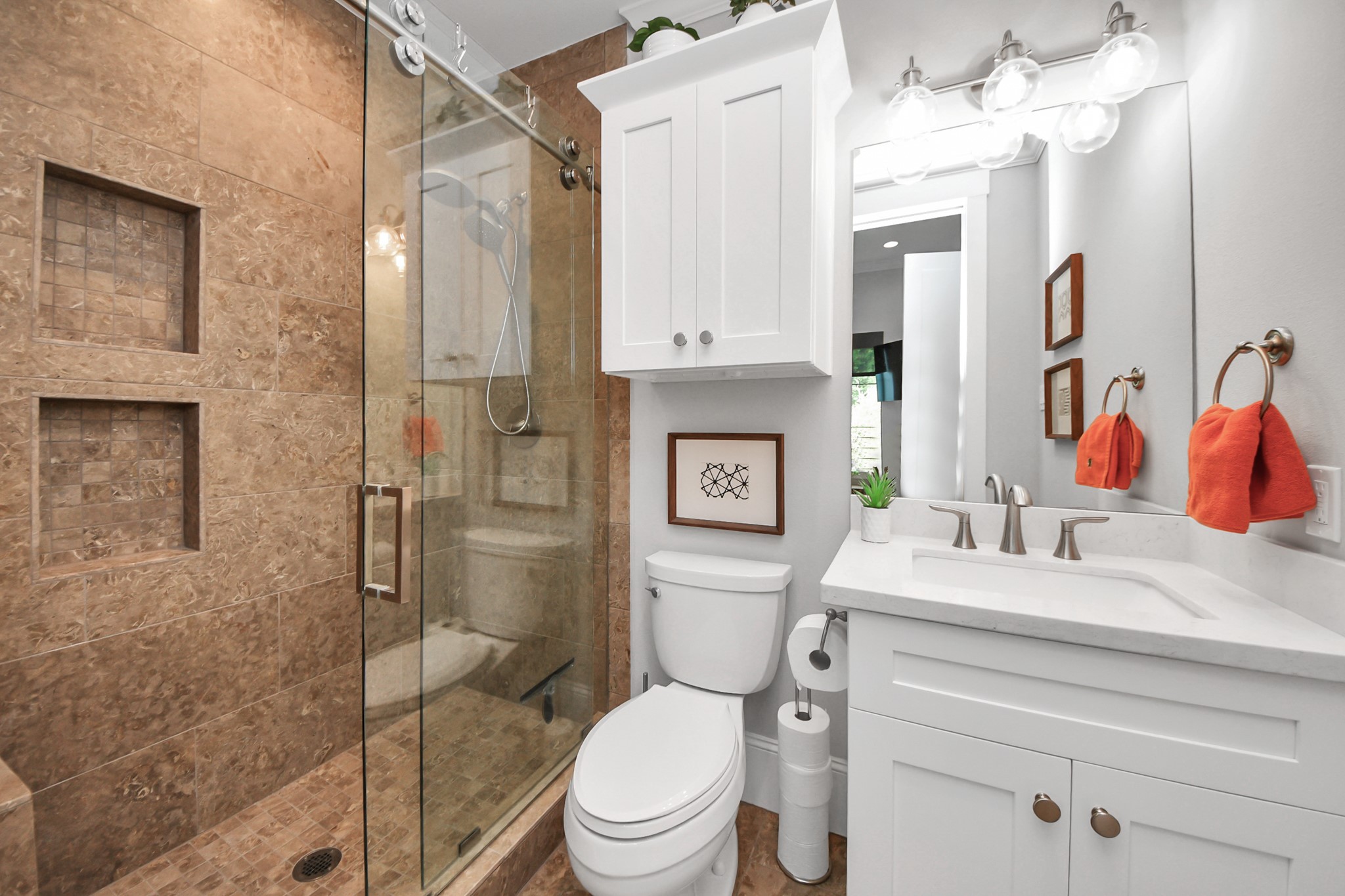 2765 Freund Street Houston, TX 77003 - Photo 8 of 44 a bathroom with a sink vanity mirror and toilet