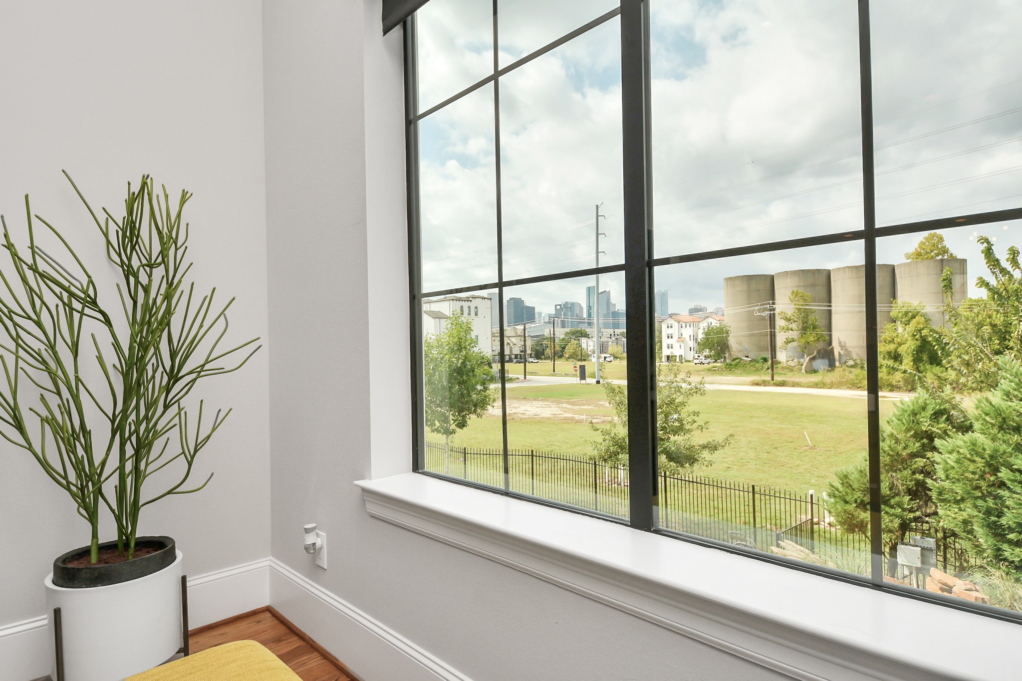2765 Freund Street Houston, TX 77003 - Photo 10 of 44 Experience breathtaking views of the downtown skyline and historic concrete silos in the Buffalo Bayou Park from your living room picture windows!