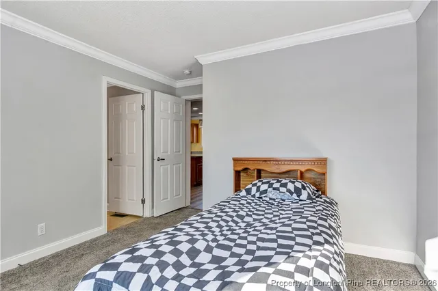 a bedroom with a bed