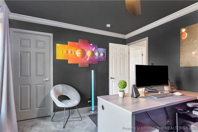 a view of a workspace with furniture