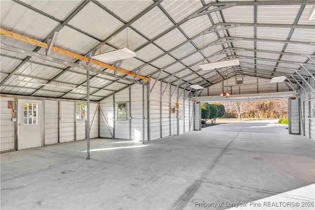 a view of a room with wooden walls