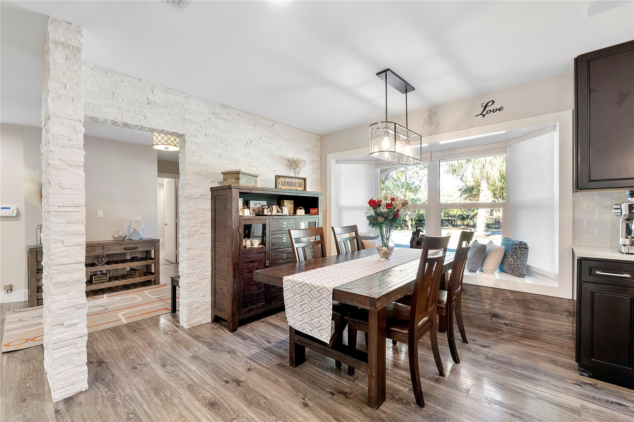 5351 Godfrey Road Parkland, FL 33067 - Photo 46 of 95 a view of a dining room with furniture window and wooden floor