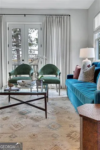 a living room with furniture and a table