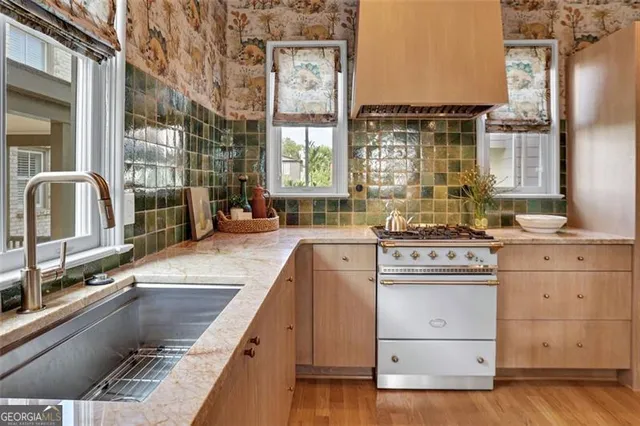a bathroom with a toilet and a shower curtain