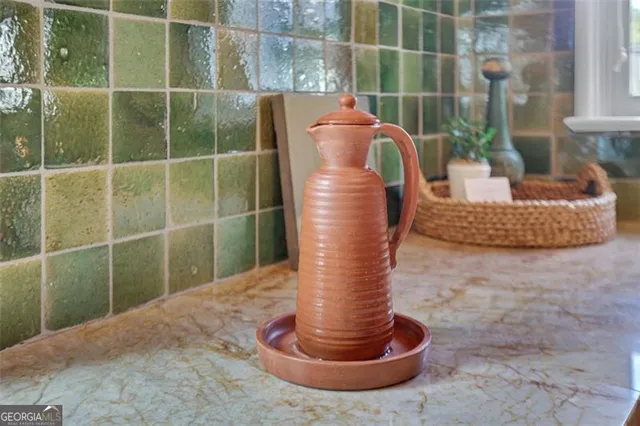 a wooden bench sitting in front of a building