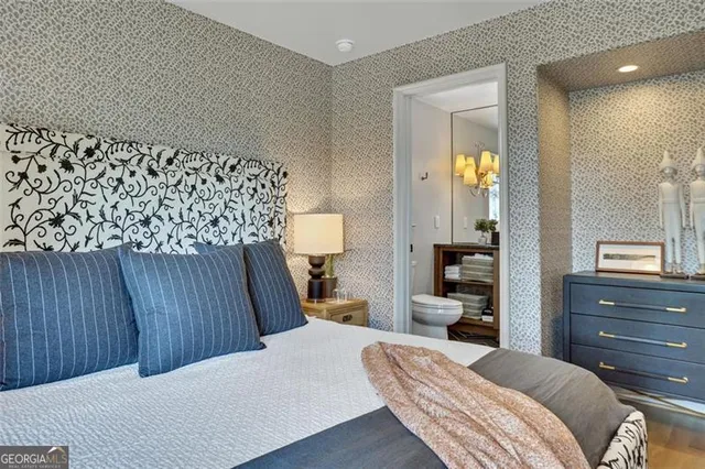 a bathroom with a sink a toilet and bathtub