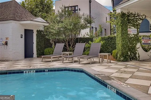 a table and chairs sitting in a backyard