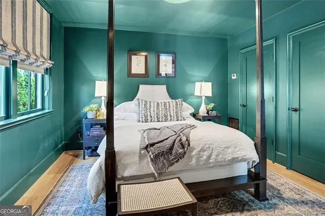 a view of staircase with a door