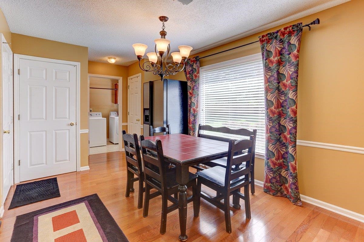 3365 Harrell Road Arlington, TN 38002 - Photo 14 of 36 a view of a dining room with furniture and wooden floor