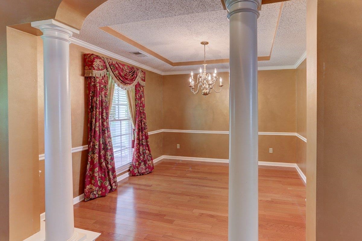 3365 Harrell Road Arlington, TN 38002 - Photo 17 of 36 a view of a hallway with wooden floor and staircase