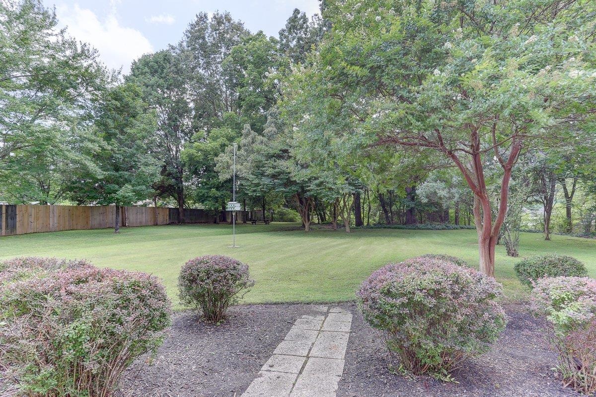 3365 Harrell Road Arlington, TN 38002 - Photo 2 of 36 a view of a backyard with large trees