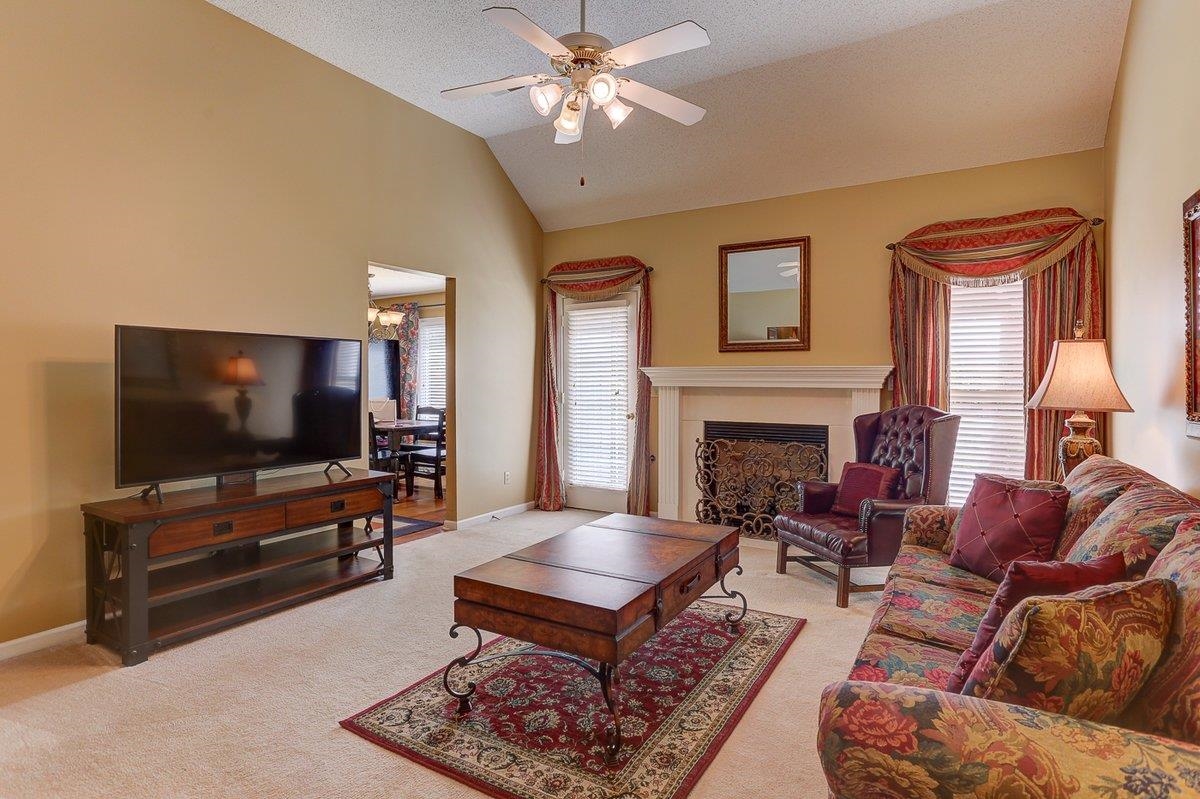 3365 Harrell Road Arlington, TN 38002 - Photo 9 of 36 a living room with furniture and a flat screen tv