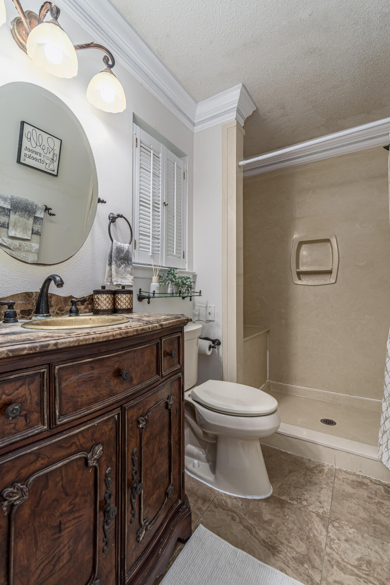 207 Country Club Road Shalimar, FL 32579 - Photo 42 of 60 a bathroom with a sink a toilet and a mirror