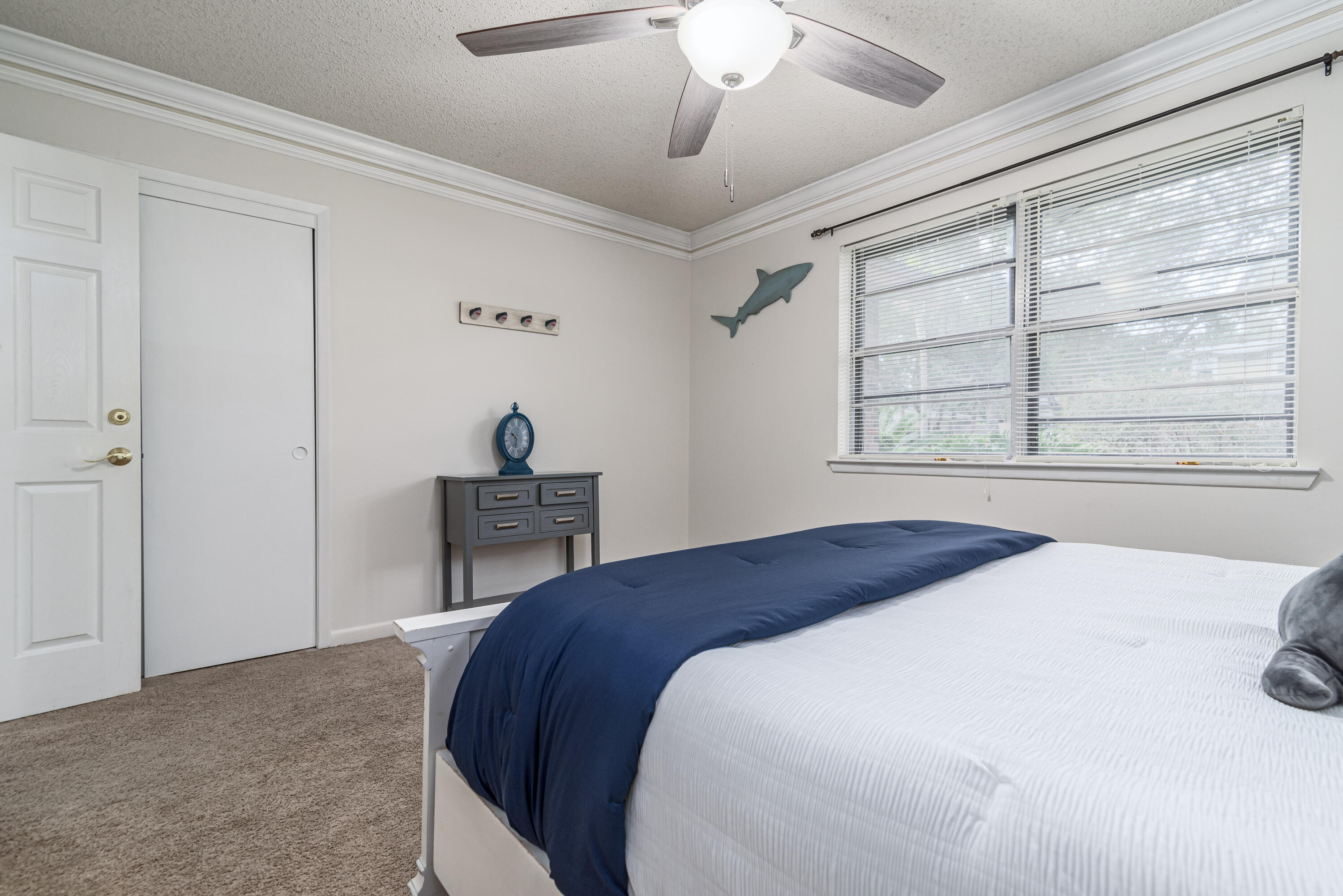 207 Country Club Road Shalimar, FL 32579 - Photo 46 of 60 a bedroom with a bed and a window