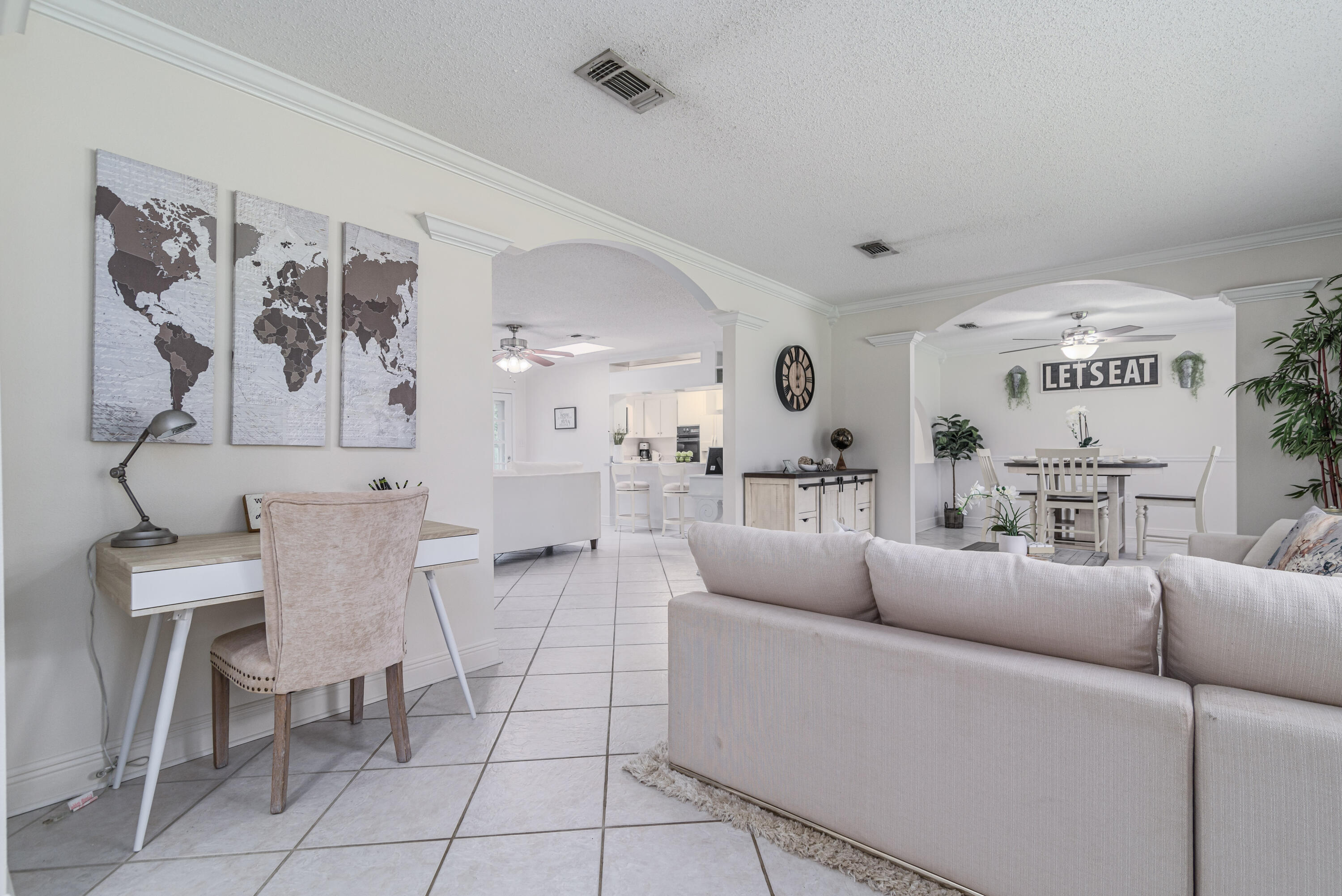207 Country Club Road Shalimar, FL 32579 - Photo 6 of 60 a living room with furniture and a view of kitchen