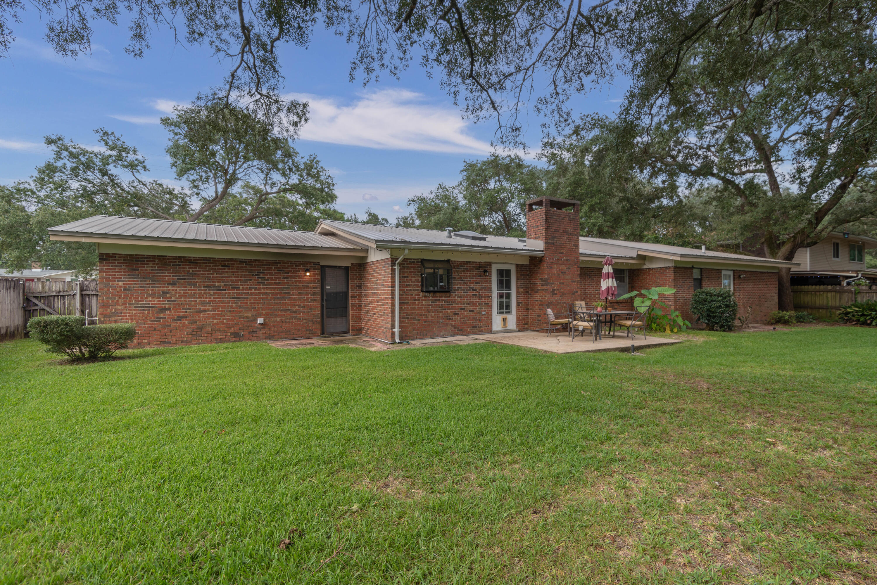 207 Country Club Road Shalimar, FL 32579 - Photo 56 of 60 front view of a house with a yard