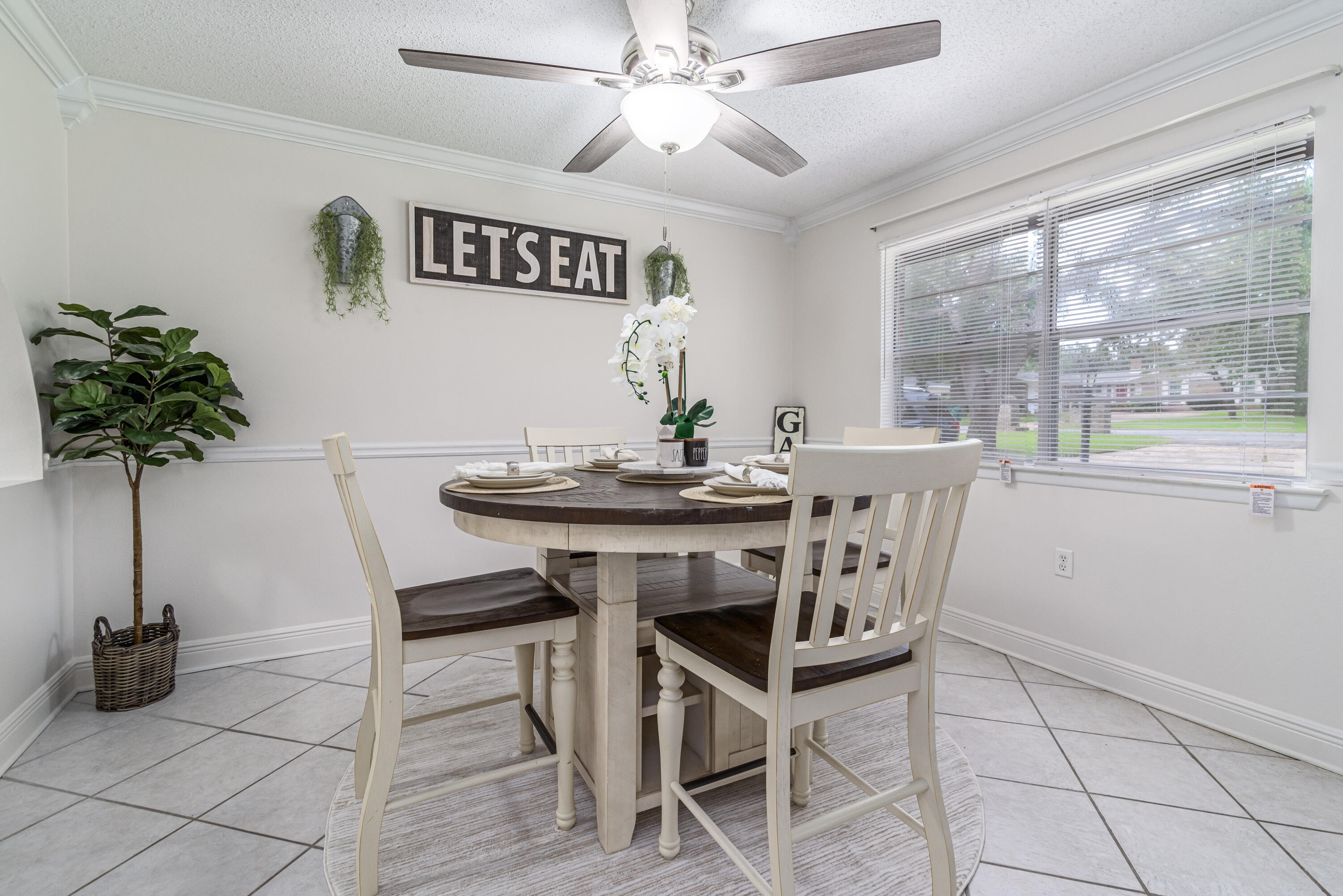 207 Country Club Road Shalimar, FL 32579 - Photo 10 of 60 a view of a dining room with furniture window and outside view
