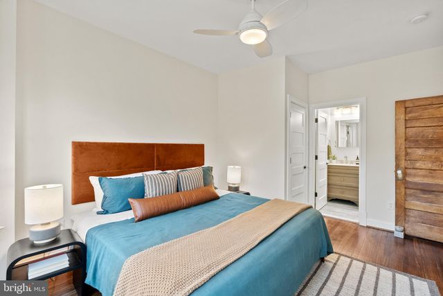 a bathroom with a shower toilet and sink
