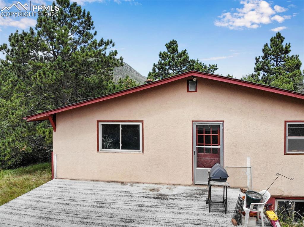 4415 Heizer Street Cascade, CO 80809 - Photo 36 of 50 side of house - Patio over garage