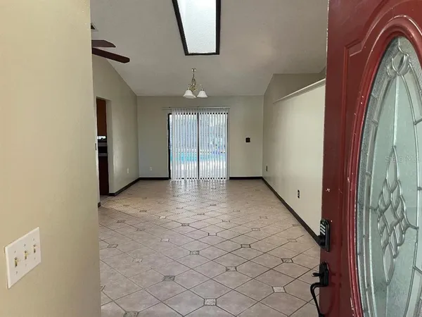 a view of a hallway with entryway