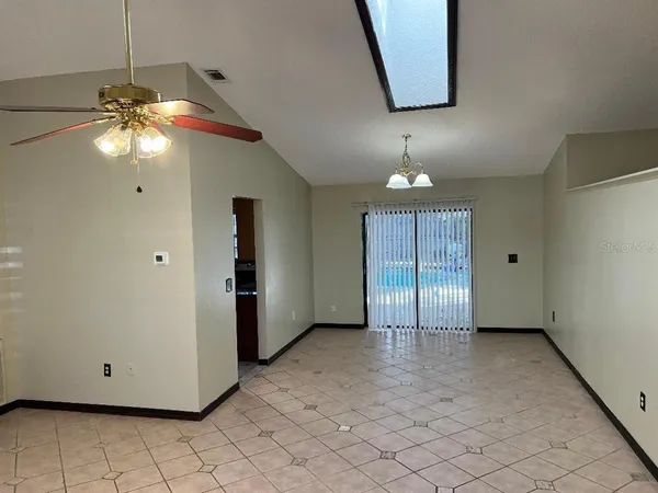 a view of an empty room with window