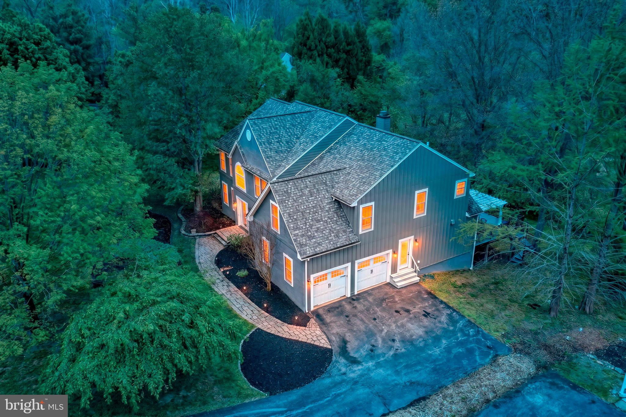 357 Willits Way Garnet Valley, PA 19060 - Photo 1 of 63 a aerial view of a house with a yard table and chairs