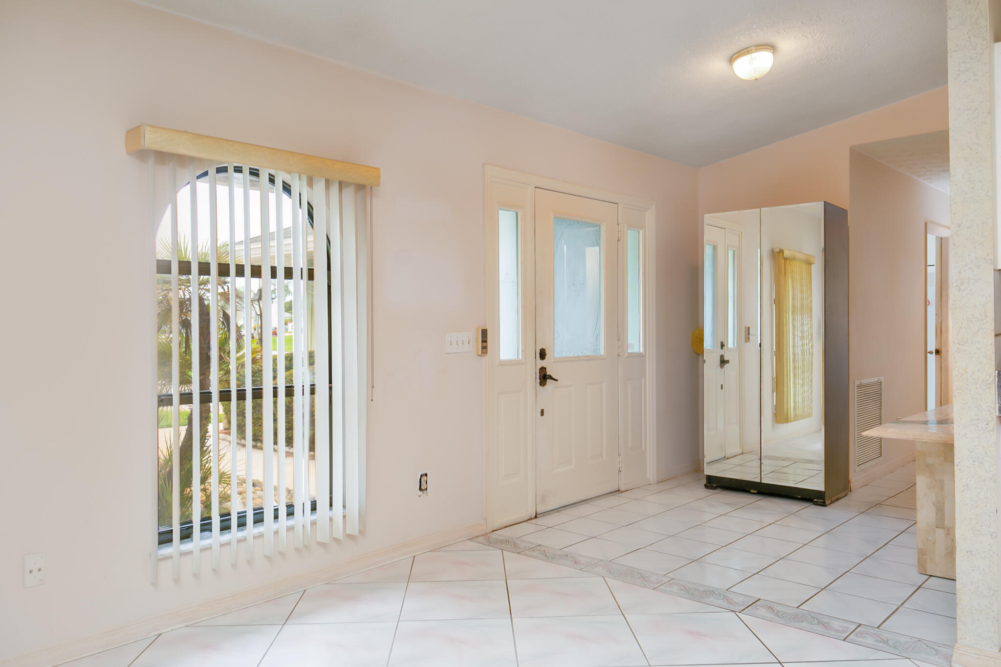 3013 Southeast Darien Road Port St. Lucie, FL 34952 - Photo 4 of 25 an empty room with windows and closet