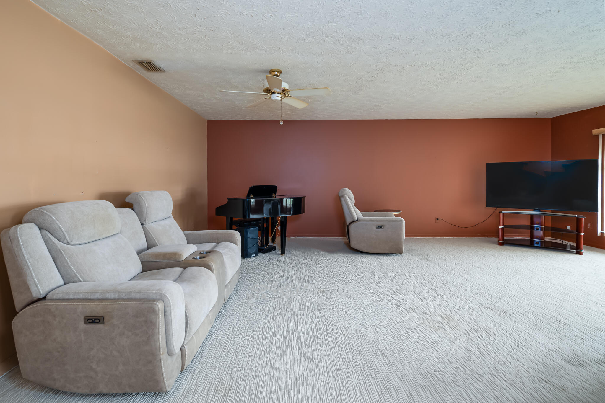 3013 Southeast Darien Road Port St. Lucie, FL 34952 - Photo 6 of 25 a living room with furniture and a flat screen tv