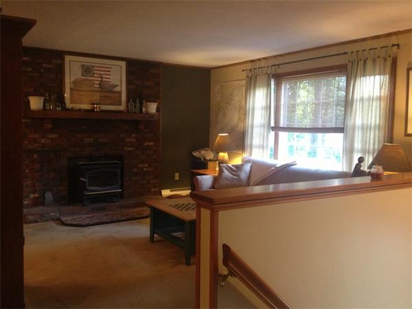 120 Howland Road Freetown, MA 02702 - Photo 5 of 14 a living room with furniture and a fireplace