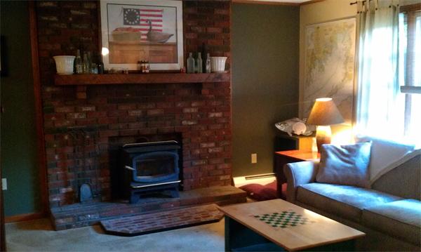 120 Howland Road Freetown, MA 02702 - Photo 6 of 14 a living room with furniture and a fireplace