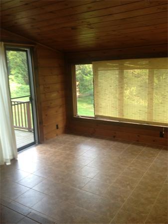 120 Howland Road Freetown, MA 02702 - Photo 8 of 14 a view of an empty room with a window