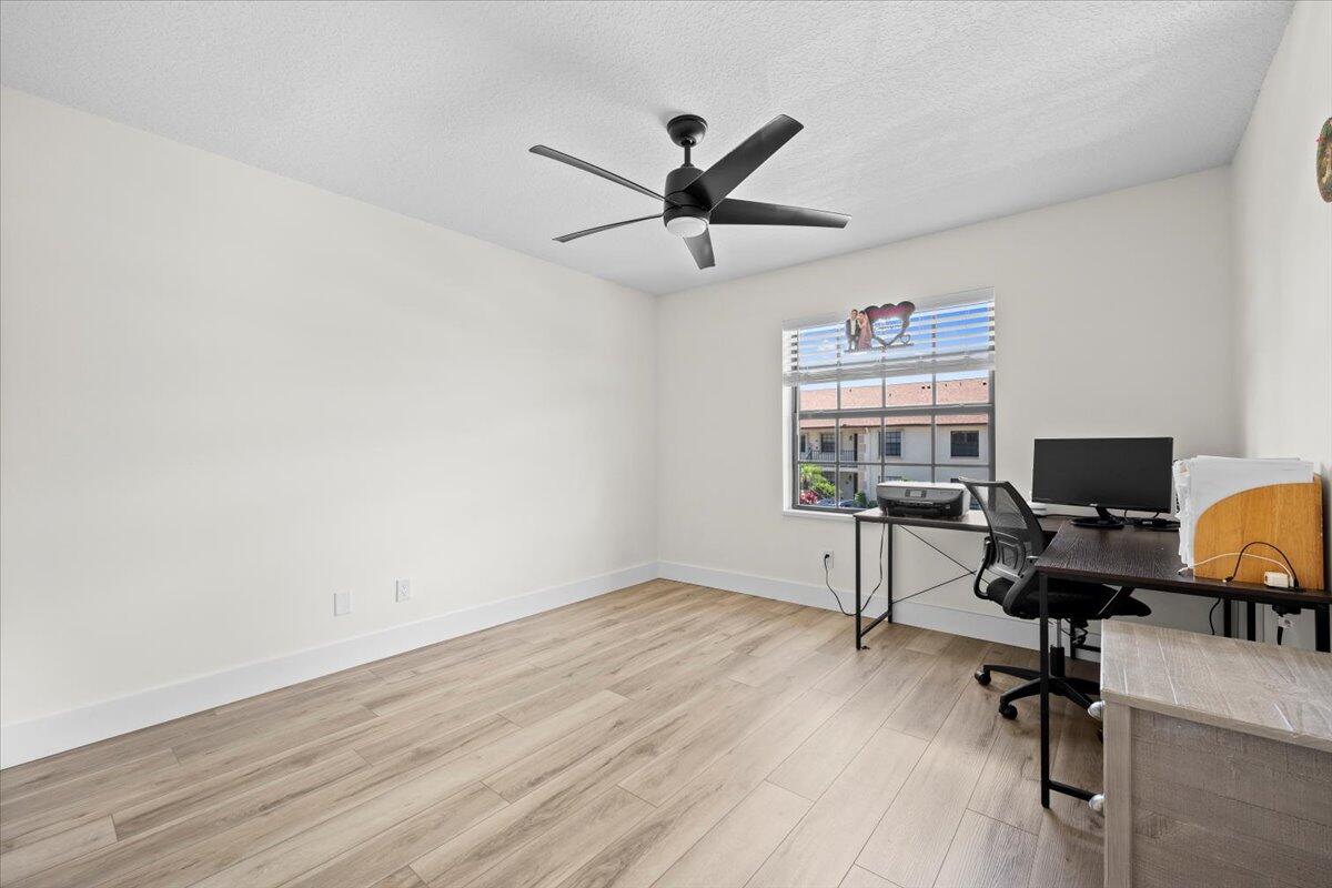 302 Pinecrest Circle, Unit D Jupiter, FL 33458 - Photo 14 of 23 Guest Bedroom