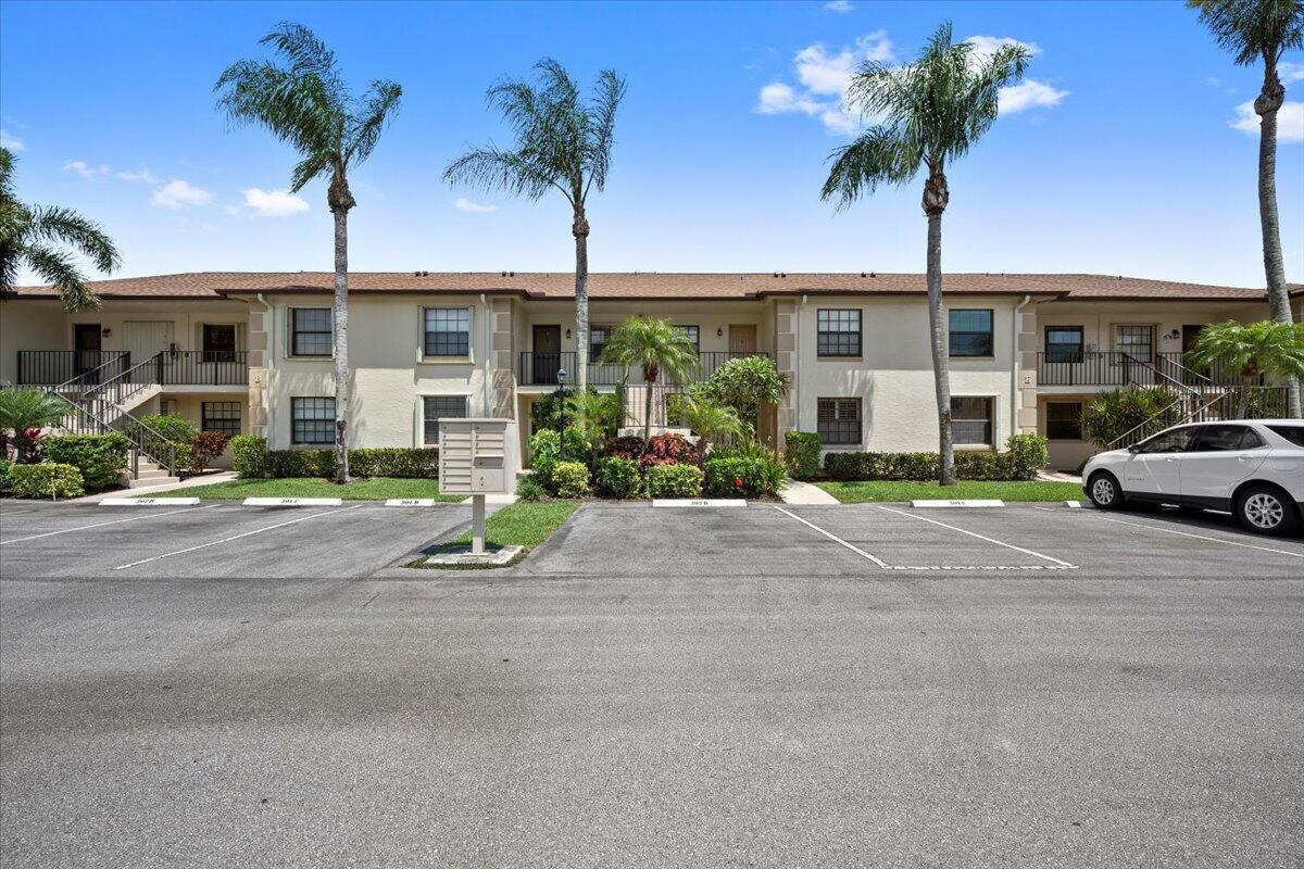 302 Pinecrest Circle, Unit D Jupiter, FL 33458 - Photo 23 of 23 front exterior of building