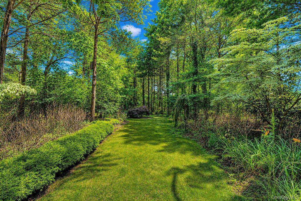 7 Tuthill Lane Remsenburg, NY 11960 - Photo 29 of 43 Garden pathway through the grounds