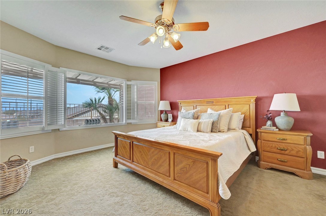 2700 Rue Montpellier Avenue Henderson, NV 89044 - Photo 21 of 39 Bedroom with ceiling fan and light colored carpet