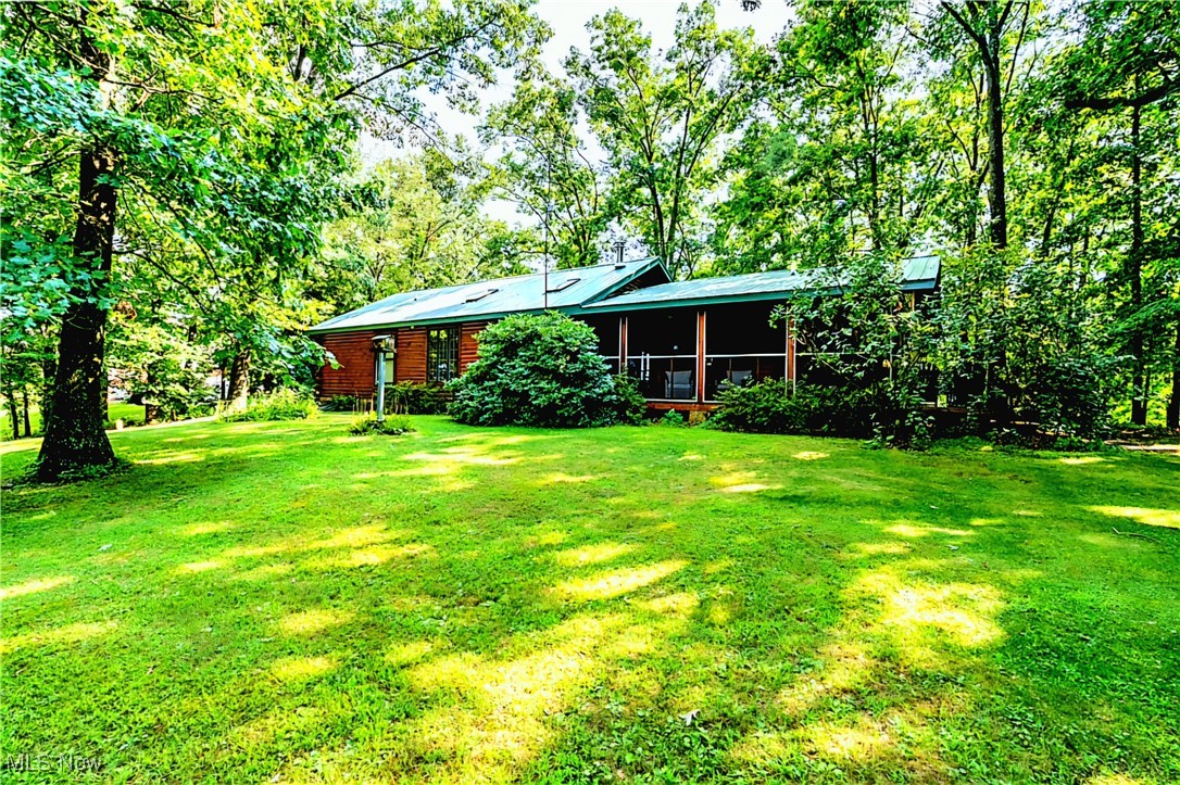 49144 Hickman Road Calcutta, OH 43920 - Photo 22 of 23 View of yard with a sunroom