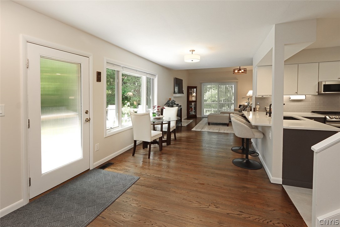 8646 Salt Springs Road Manlius, NY 13104 - Photo 5 of 48 Dining area and kitchen overlooking the private wo