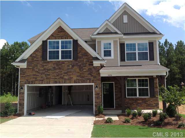 78054 Rillstone Drive Lancaster, SC 29720 - Photo 1 of 11 a front view of a house with garden