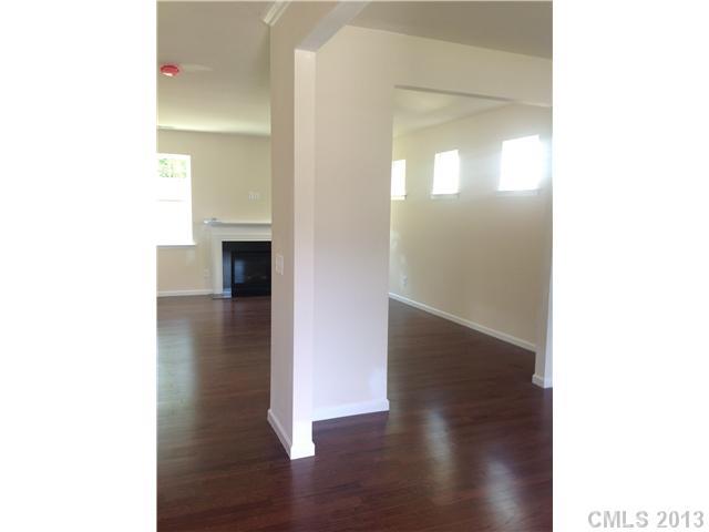 78054 Rillstone Drive Lancaster, SC 29720 - Photo 2 of 11 a view of a hallway with wooden floor