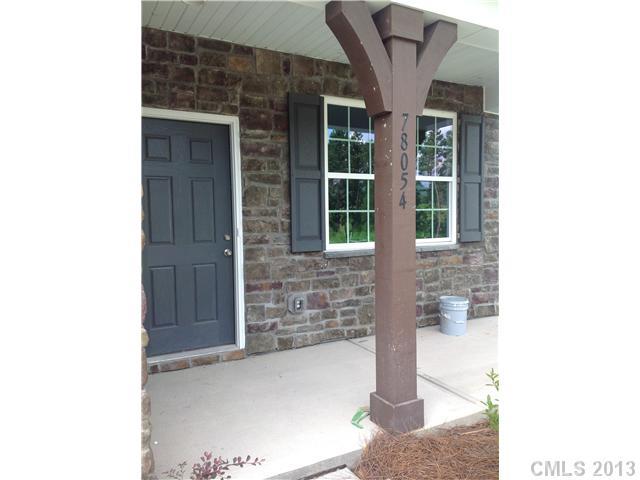 78054 Rillstone Drive Lancaster, SC 29720 - Photo 6 of 11 a front view of a house with plants