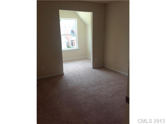 78054 Rillstone Drive Lancaster, SC 29720 - Photo 8 of 11 a view of an empty room with a window