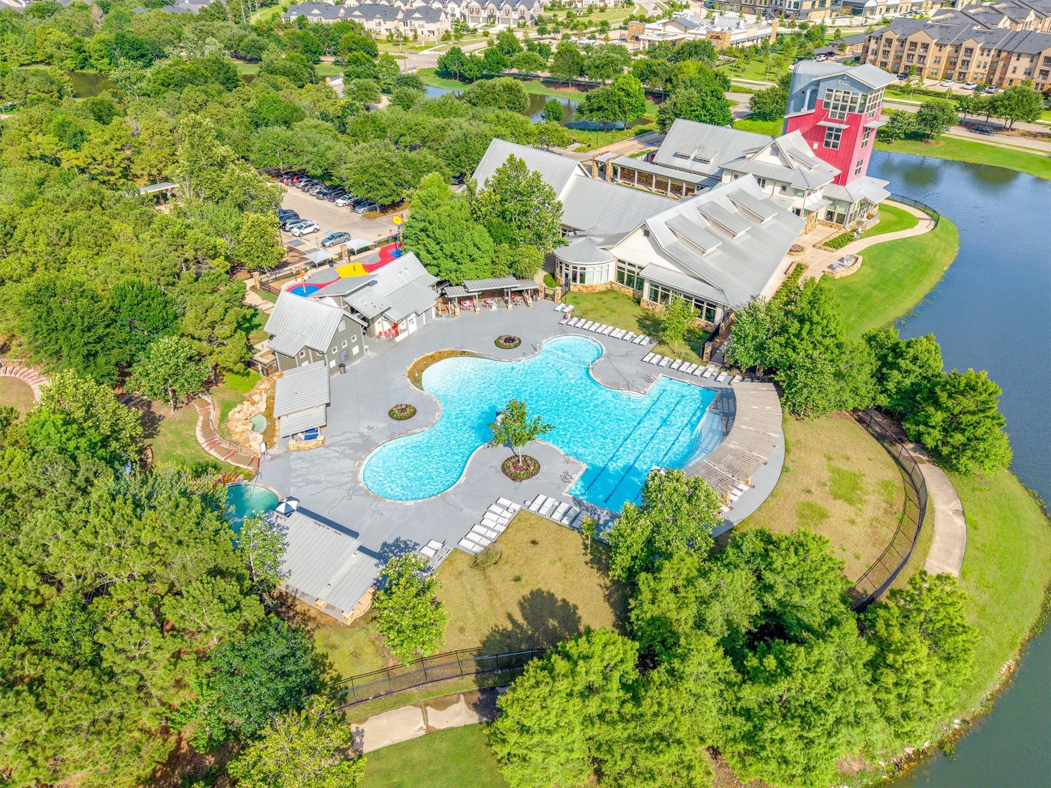 29118 Lantana Ridge Court Fulshear, TX 77441 - Photo 23 of 29 Enjoy a sparkling community pool and a playground within the neighborhood, perfect for family fun, social gatherings, and a vibrant, active lifestyle.