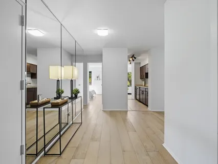 an empty room with wooden floor