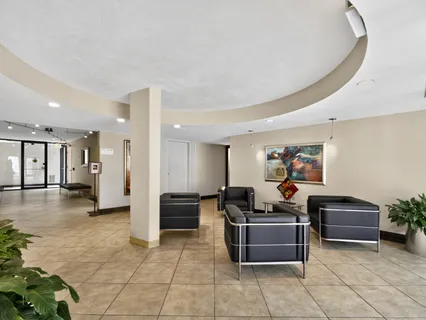 a room with furniture and a flat screen tv